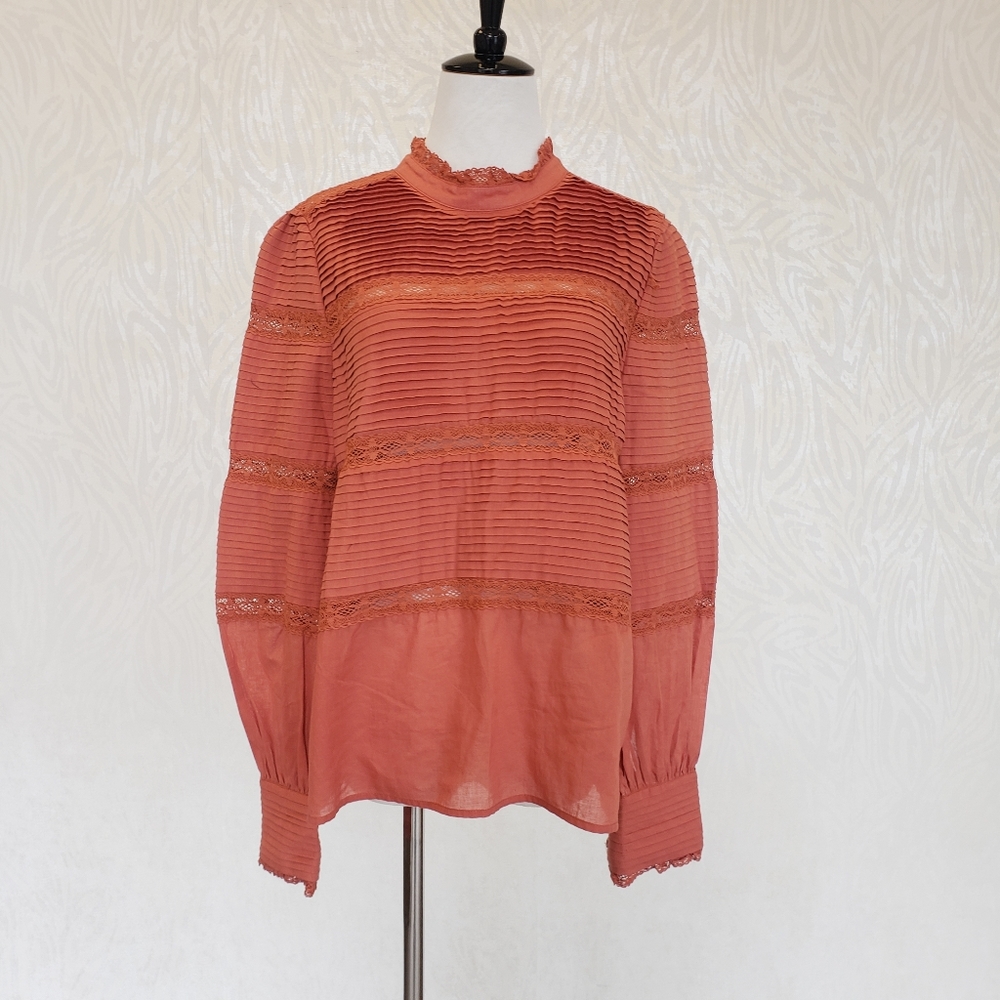 ORANGE TOP WITH LONG SLEEVES